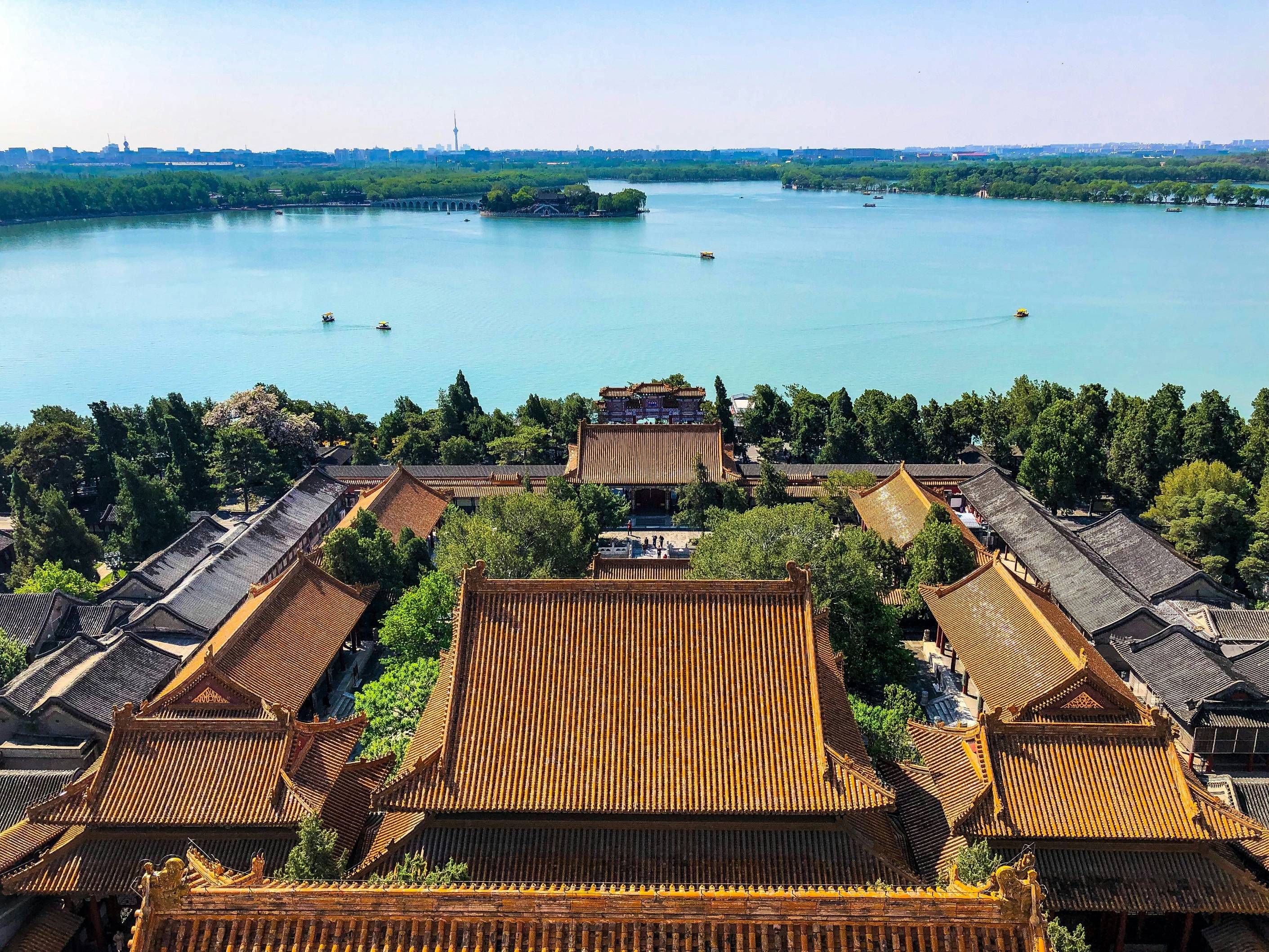 brown roof near body of water during daytime